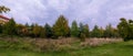 Countryside Rural Field Or Meadow Landscape With Green Grass On Foreground And Forest On Background Under Scenic Spring Royalty Free Stock Photo