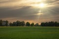 Countryside Rural Field Or Meadow Landscape With Green Grass Under Scenic Sunset Sunrise Sky. Panorama Of Agricultural Landscape Royalty Free Stock Photo