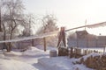 In the countryside there is a strong frost it is cold everything is covered with snow and frost