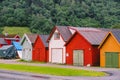 Countryside view of colored wooden buildings. Boathouses in Norway. Scandinavian traditional boat houses. multi-colored garage Royalty Free Stock Photo