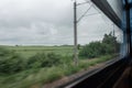 Countryside view outside the train window - travel, transport, journey concept Royalty Free Stock Photo