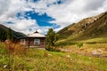 Countryside village houses buildings traditional life in Karakol valley on trail to Ala Kul lake. Karakol valley, Issyk-kul