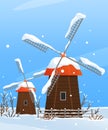 Countryside with windmill, village architecture in snowy weather. Farmyard landscape in winter