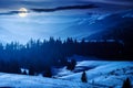 countryside winter scenery in carpathian mountains at night Royalty Free Stock Photo