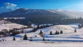 Countryside winter scenery in carpathian mountains Royalty Free Stock Photo