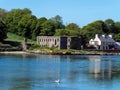 The ruins of grain store on the shore of Clonakilty Bay on a sunny spring day. Irish landscape