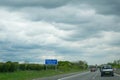 Road sign warning drivers to check your distance and keep two chevrons apart