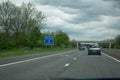 Road sign warning drivers to check your distance and keep two chevrons apart