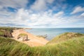 Durham Heritage Coast and view of Blast Beach on sunny summer day