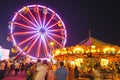 County Fair at night with ferris wheel Royalty Free Stock Photo