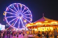 County Fair at night with ferris wheel Royalty Free Stock Photo