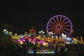 County Fair at night Ferris Wheel on the Midway Royalty Free Stock Photo