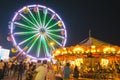 County Fair at night with ferris wheel Royalty Free Stock Photo