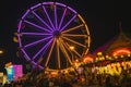 County Fair at night Ferris Wheel on the Midway Royalty Free Stock Photo