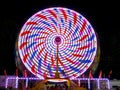 County Fair ride, at night, in motion. Gwinnett County, GA. Royalty Free Stock Photo