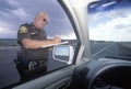 County sheriff giving speeding ticket, New Mexico Royalty Free Stock Photo