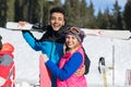 Coupe Ski And Snowboard Resort Winter Snow Mountain Hispanic Man Woman Embrace Holiday