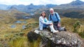 Couple active tourists seniores in mountains