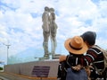 Couple Admiring the Famous Moving Lovers Monument of Ali and Nino in Batumi City, Georgia