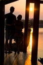 Couple admiring the sunset in Kanchanaburi, Thailand