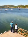A couple admiring the view at Lagoa da Conceicao - Florianopolis, Brazil