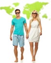 Couple against world map Royalty Free Stock Photo