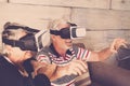 Seniors couple at home trying goggles headset