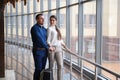 Couple at the bright airport waiting aircraft Royalty Free Stock Photo