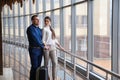 Couple at the bright airport waiting aircraft Royalty Free Stock Photo