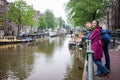 Couple in Amsterdam rainy day Royalty Free Stock Photo