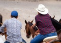 Couple of anonymous Mexican Charros riding horses