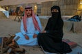 Couple with Arabic clothes during Dubai desert safari at the safari camp, Dubai United Arab Emirates Royalty Free Stock Photo