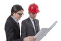 Couple of architects revising a house project on white background Royalty Free Stock Photo
