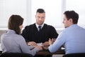 Couple Arguing With Each Other In Front Of Judge Royalty Free Stock Photo