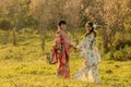 Couple asian women wearing traditional japanese kimono. Royalty Free Stock Photo