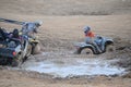 Couple of ATV's Stuck in the Mud Royalty Free Stock Photo