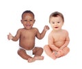 Couple of babies sitting on the floor Royalty Free Stock Photo