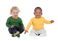 Couple of babies sitting on the floor Royalty Free Stock Photo