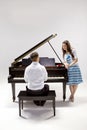 Couple with baby Grand piano 2 Royalty Free Stock Photo