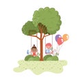 Couple baby in swing smiling in landscape