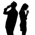 Couple back to back man on the phone and woman Royalty Free Stock Photo