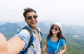 Couple With Backpacks Take Selfie Photo Over Mountain Landscape Trekking, Young Man And Woman On Hike Tourists Royalty Free Stock Photo