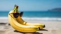 a couple of bananas in sunglasses lie on the beach and sunbathe Royalty Free Stock Photo