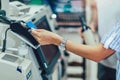 Couple with bank card buying food at grocery store or supermarket self-checkout Royalty Free Stock Photo