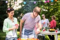 Couple at barbecue party Royalty Free Stock Photo