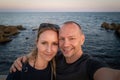 A couple at the Barcelona Beach at sunset Royalty Free Stock Photo