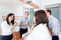 Couple in the bathroom getting ready for work Royalty Free Stock Photo