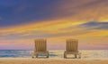 Couple of beach beds on tropical beach