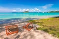 Couple of beach chairs on sea coast at Thailand Royalty Free Stock Photo