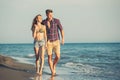 Couple on the beach having fun. Royalty Free Stock Photo